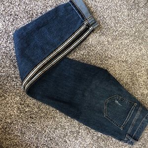 Jeans with ribbon accent on legs